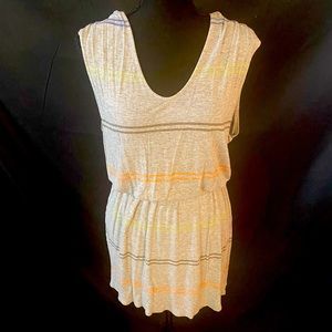 Black, coral and neon green stripes. 100% Rayon with a scoop neckline.